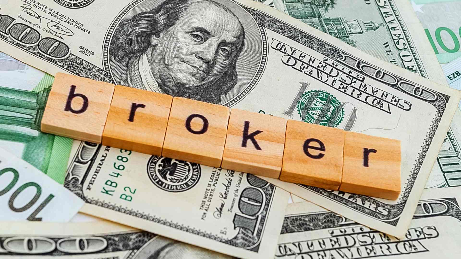 Image of the word BROKER with dollar signs in the background, symbolizing finance and investment opportunities.